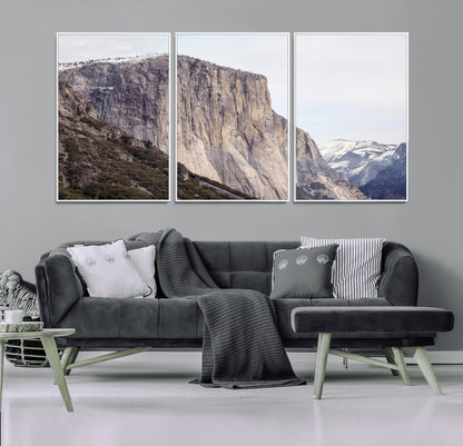 Framed canvas of El Capitan’s vertical granite face in Yosemite with snowy peaks, ideal for Sierra minimalism or mountain-inspired decor.