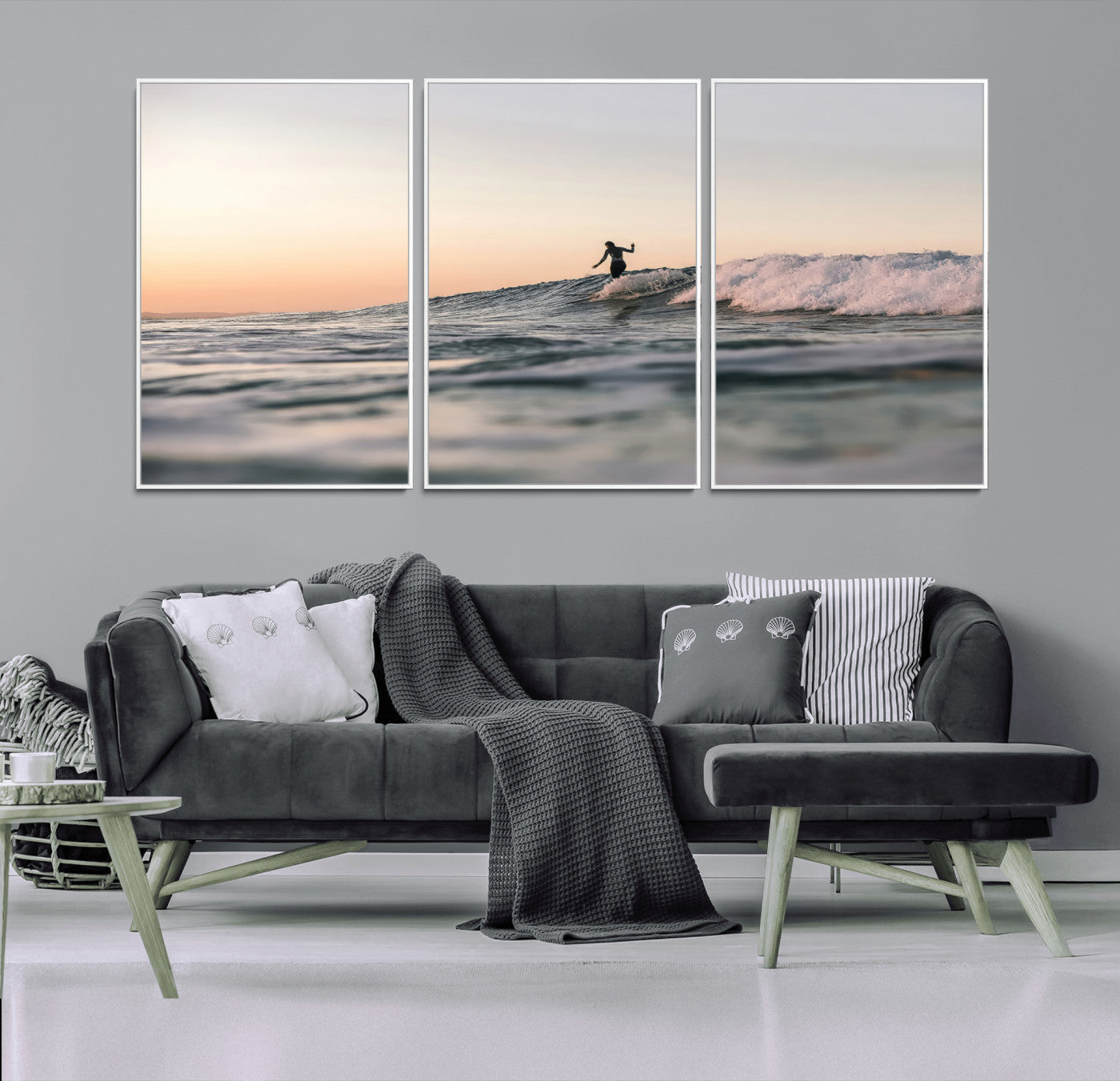 Framed canvas of a female surfer balancing on a wave at sunset, perfect for serene surf or ocean-inspired coastal decor.