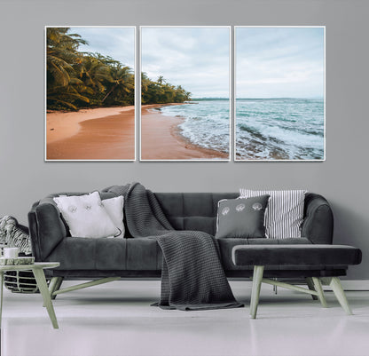 Framed canvas of a tropical beach with palm trees and soft waves, ideal for coastal escape or serene nature-inspired home decor.