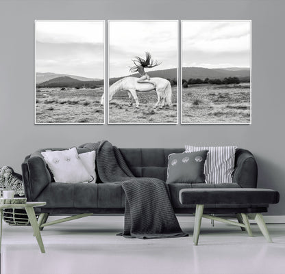 Black and white photo of a woman on a white horse in moody tones, ideal for Western Boho or modern rustic-style home decor.