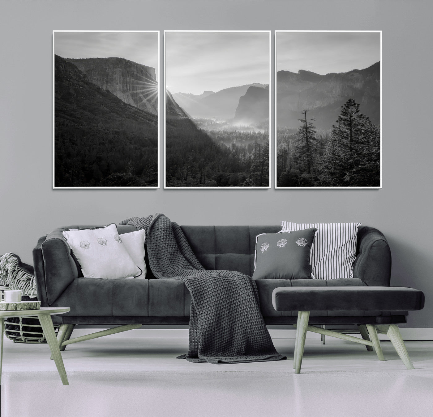 Black and white landscape of Yosemite with sun rays peeking over El Capitan, ideal for moody nature or modern rustic decor.