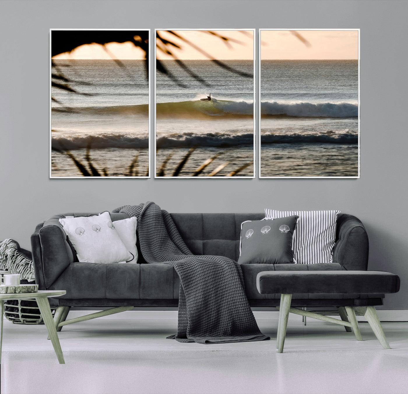 Photo of a surfer riding a golden hour wave at sunset, with tropical tones and dreamy light, perfect for tropical boho or coastal home decor.
