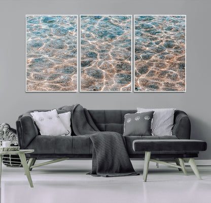 Close-up of sunlit ocean ripples with aqua blue and golden tones, ideal for modern coastal or minimalist home decor.