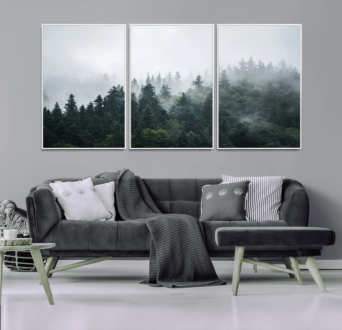 A misty evergreen forest shrouded in soft fog, creating a tranquil and moody landscape with lush green trees fading into the distance.