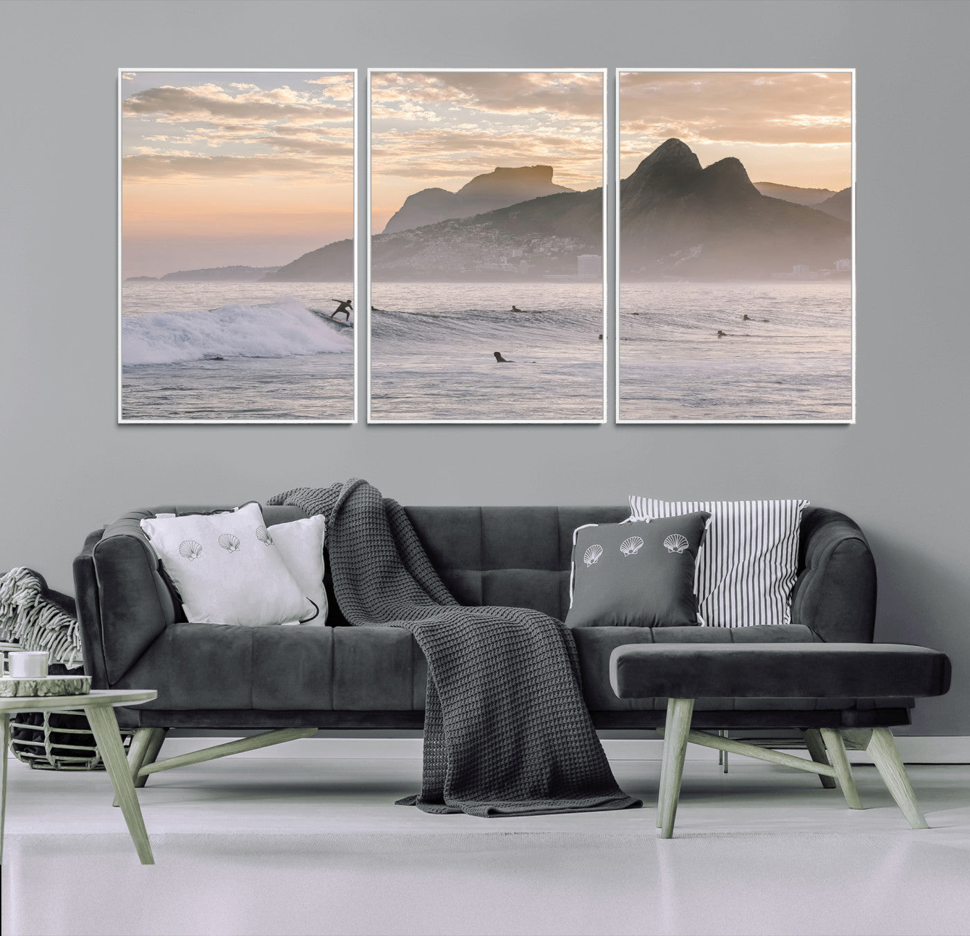 A surfer rides a golden hour wave near misty coastal mountains, surrounded by fellow surfers, capturing the spirit of a coastal adventure.