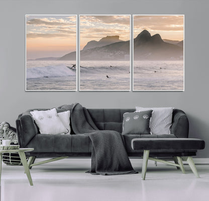 A surfer rides a golden hour wave near misty coastal mountains, surrounded by fellow surfers, capturing the spirit of a coastal adventure.