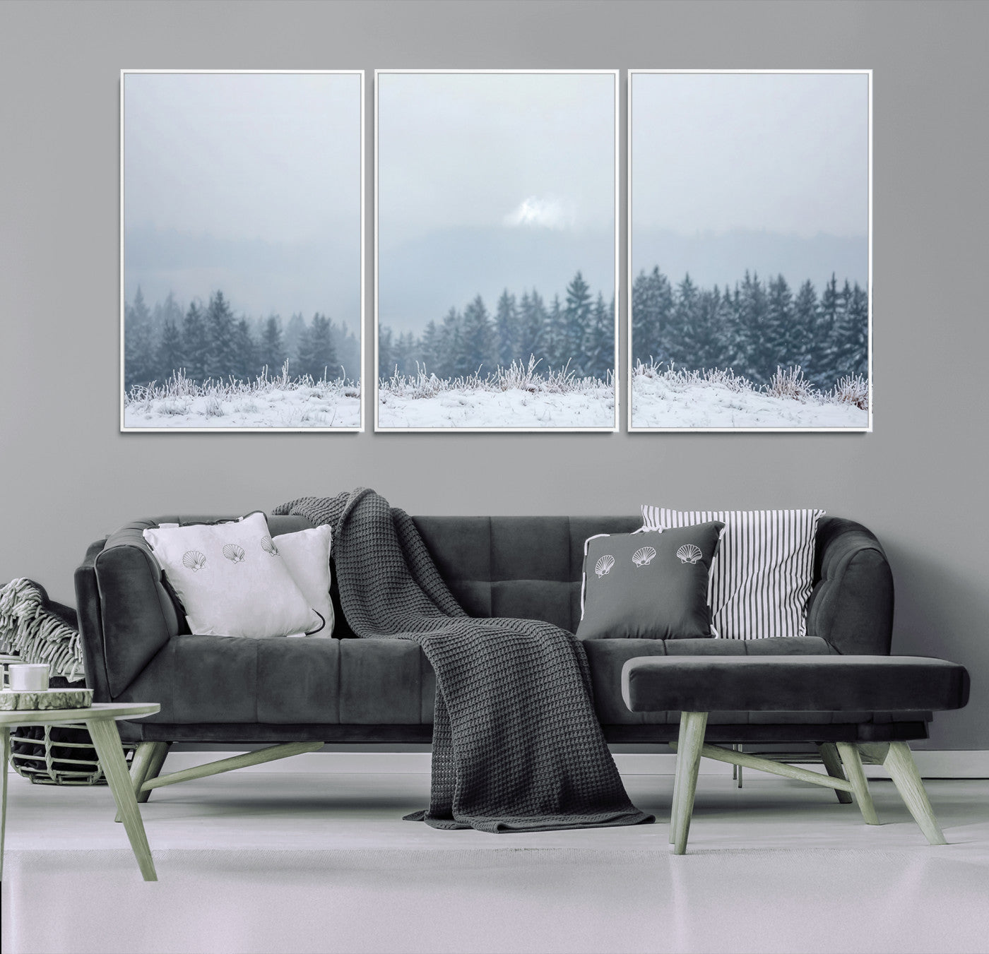 Snow-covered forest under misty sky, soft light breaking through clouds, ideal for minimalist or Nordic-inspired home decor.