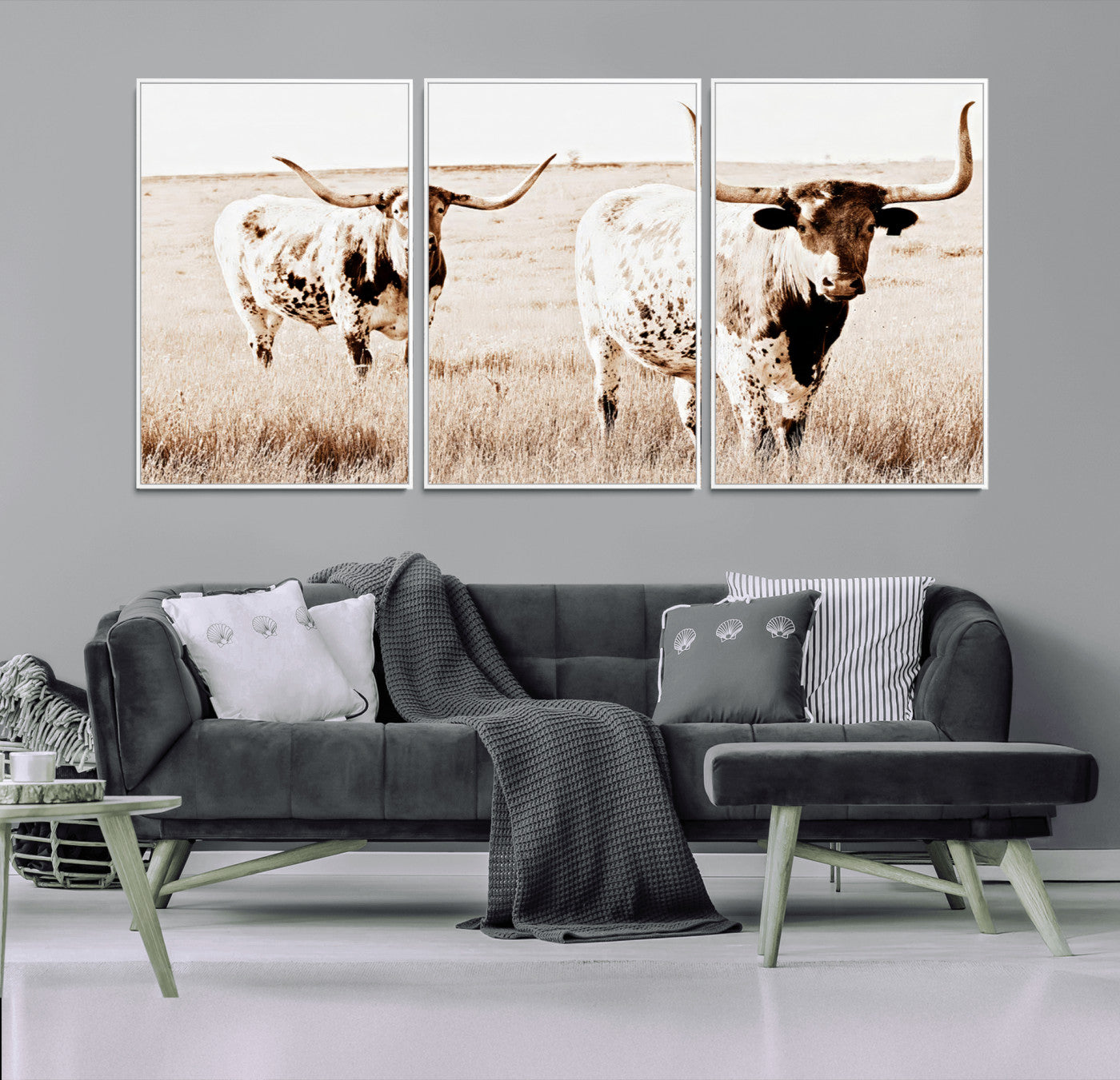 Two Texas longhorn cows standing in a sepia-toned pasture, evoking rustic charm perfect for farmhouse or western country interiors. (