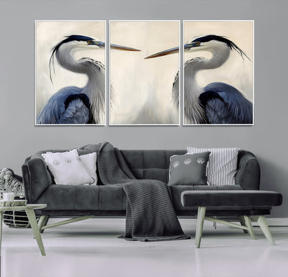 Two blue herons facing each other on a soft neutral background, ideal for coastal, tranquil, or nature-inspired minimalist interiors.