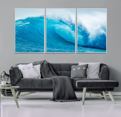 Vibrant canvas of a powerful curling ocean wave in tropical blue tones, perfect for coastal or surf-inspired decor settings.