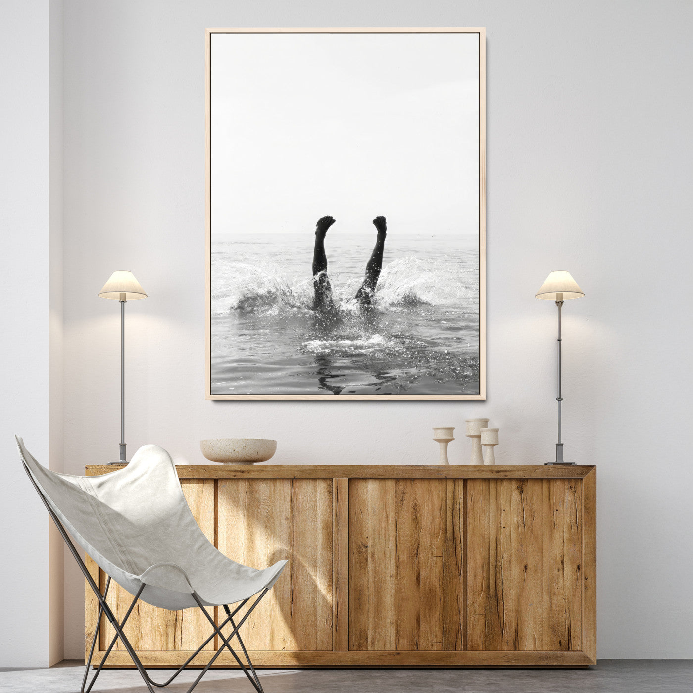 Black and white ocean art featuring a swimmer's legs mid-splash, perfect for minimalist, coastal, or monochrome modern interiors.