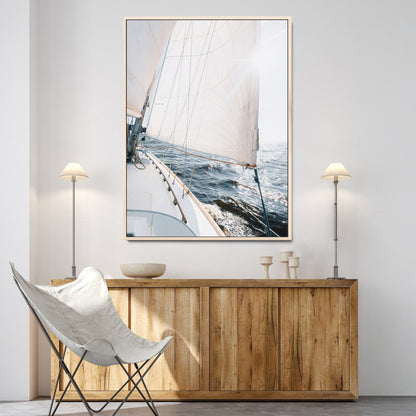 Canvas of a sailboat gliding on a sunlit ocean with white sails and sparkling water, ideal for coastal minimalist or nautical-style home decor.