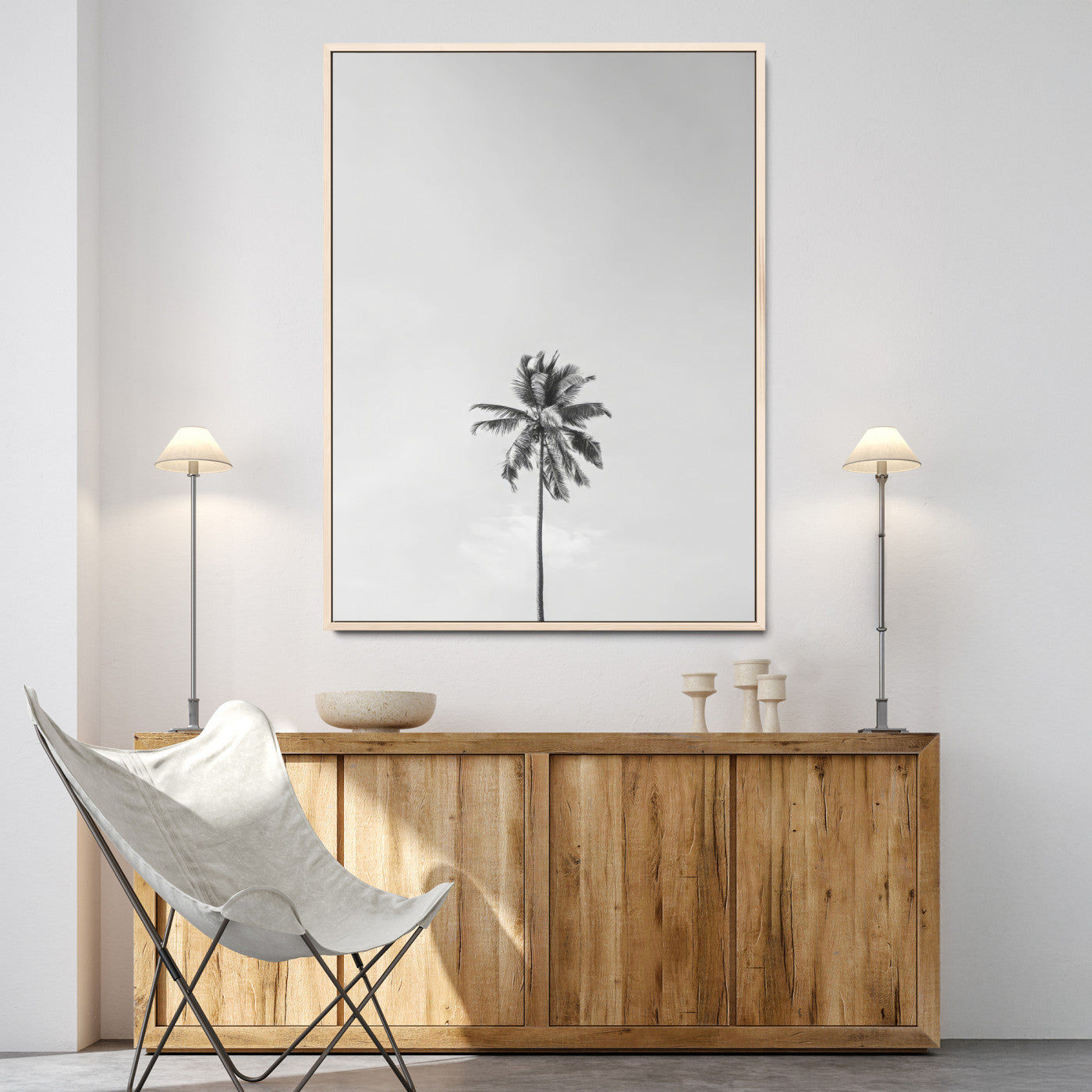 Canvas of a single palm tree in black and white with minimalist sky, ideal for modern coastal minimalist or tropical-inspired home decor.