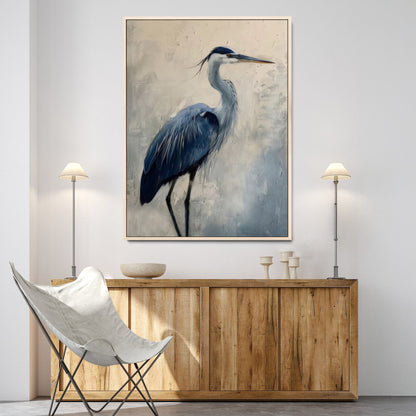 Blue heron standing gracefully on one leg, painted in soft neutrals and cool tones, perfect for modern coastal or nature-inspired decor.