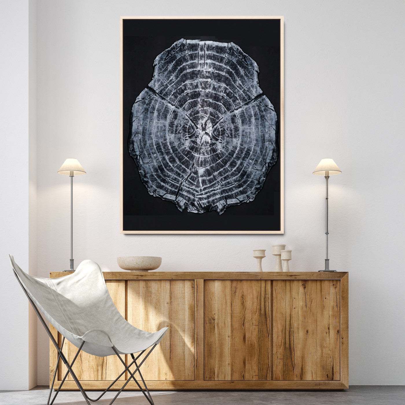 Monochrome tree ring cross-section on black background, showing detailed growth lines, perfect for modern rustic or minimalist interiors. (