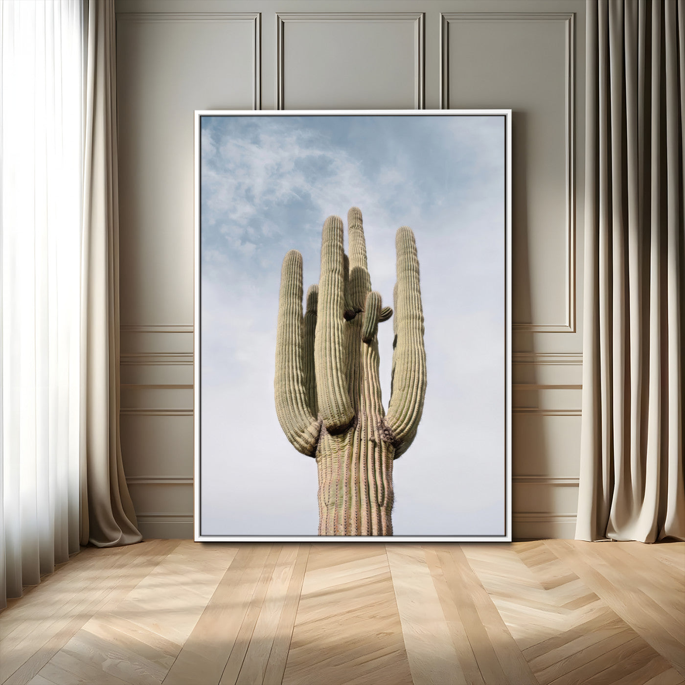 Vertical photo of a tall saguaro cactus against a soft sky, ideal for earthy or Southwestern home decor with warm neutral tones.