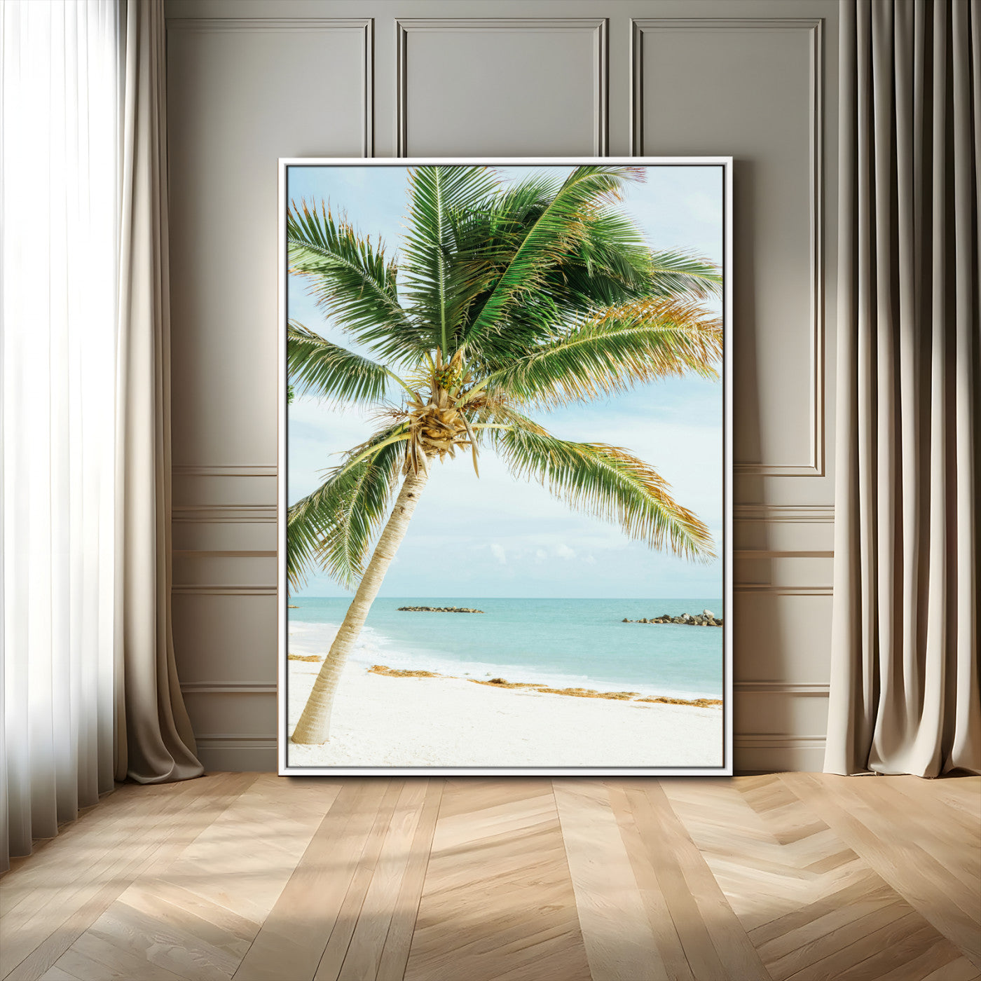A tall palm tree leaning over a white sandy beach with turquoise ocean waves, creating a peaceful and tropical coastal scene.