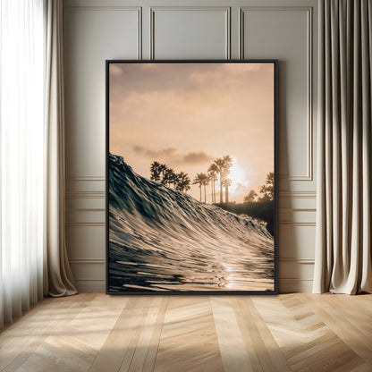 Golden sunset view of an ocean wave curling near palm trees, radiating warm tones perfect for coastal or tropical-themed decor.
