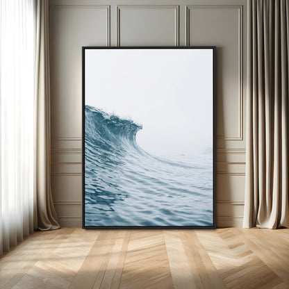 A single ocean wave curling in soft blue tones under a misty sky, ideal for coastal or minimalist home wall decor.