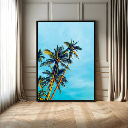 "Tall palm trees with golden sunlight against a vibrant blue sky, creating a tropical, relaxing atmosphere for coastal and beach-themed decor.