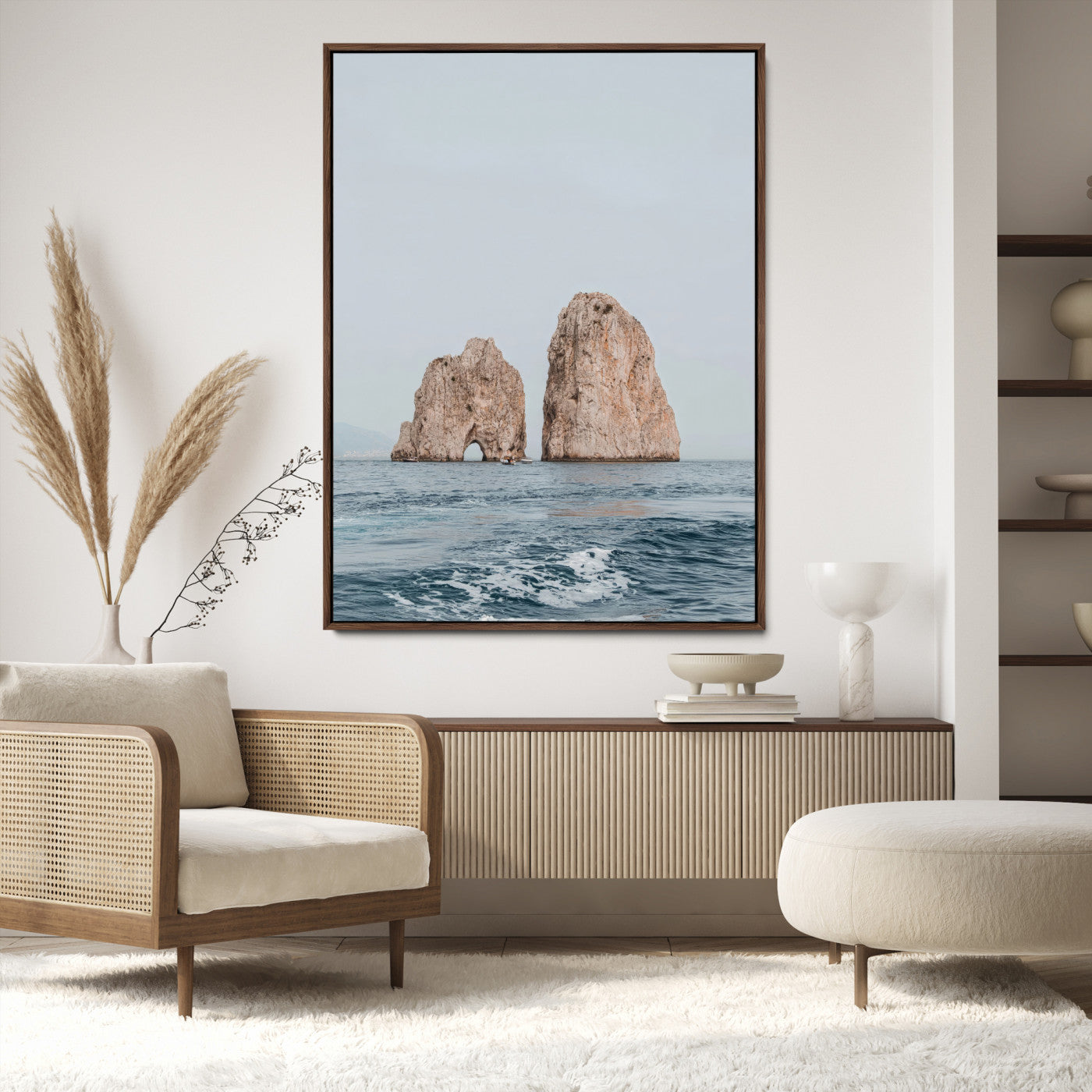 Serene photograph of the Faraglioni rocks in Capri with calm blue waters, perfect for Mediterranean coastal or minimalist travel-themed decor.
