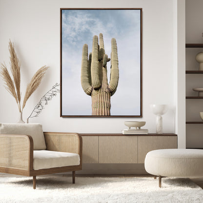 Vertical photo of a tall saguaro cactus against a soft sky, ideal for earthy or Southwestern home decor with warm neutral tones.