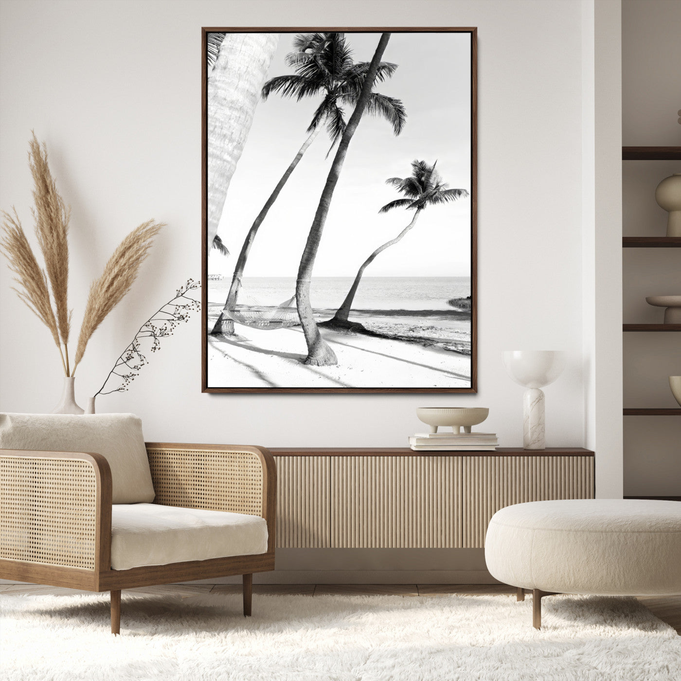 Black and white wall art of palm trees and a hammock on a beach, ideal for coastal minimalist or tropical-themed decor.