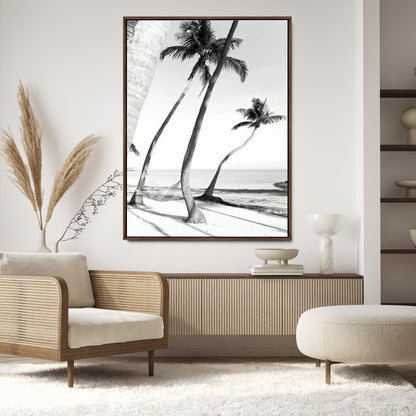 Black and white wall art of palm trees and a hammock on a beach, ideal for coastal minimalist or tropical-themed decor.