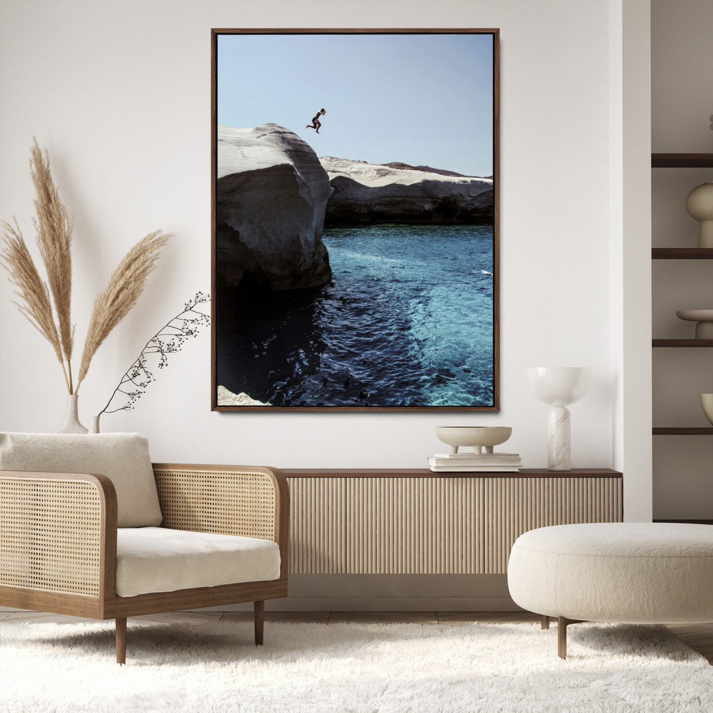 Canvas of a cliff diver above turquoise waters and rocky coastline under clear sky, ideal for adventurous minimalist or coastal home decor.