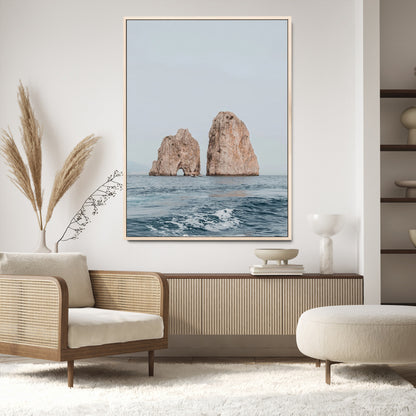 Serene photograph of the Faraglioni rocks in Capri with calm blue waters, perfect for Mediterranean coastal or minimalist travel-themed decor.