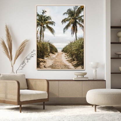 Canvas wall art of a tropical beach path with palm trees and dune grass, ideal for coastal entryways or tropical-inspired home decor.