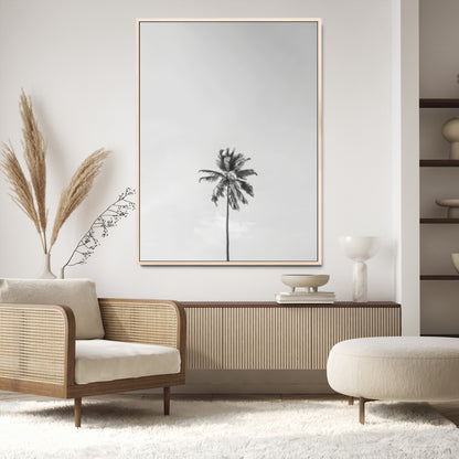 Canvas of a single palm tree in black and white with minimalist sky, ideal for modern coastal minimalist or tropical-inspired home decor.