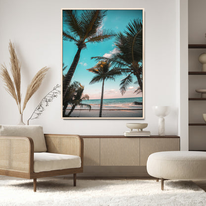 Tall palm trees swaying over a tropical beach with turquoise ocean waves and a soft sunset glow, creating a relaxing coastal vibe.