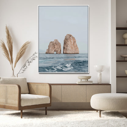 Serene photograph of the Faraglioni rocks in Capri with calm blue waters, perfect for Mediterranean coastal or minimalist travel-themed decor.