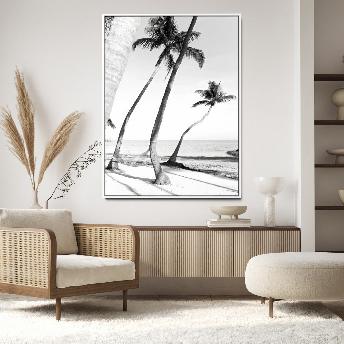 Black and white wall art of palm trees and a hammock on a beach, ideal for coastal minimalist or tropical-themed decor.