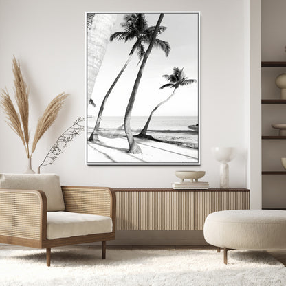 Black and white wall art of palm trees and a hammock on a beach, ideal for coastal minimalist or tropical-themed decor.