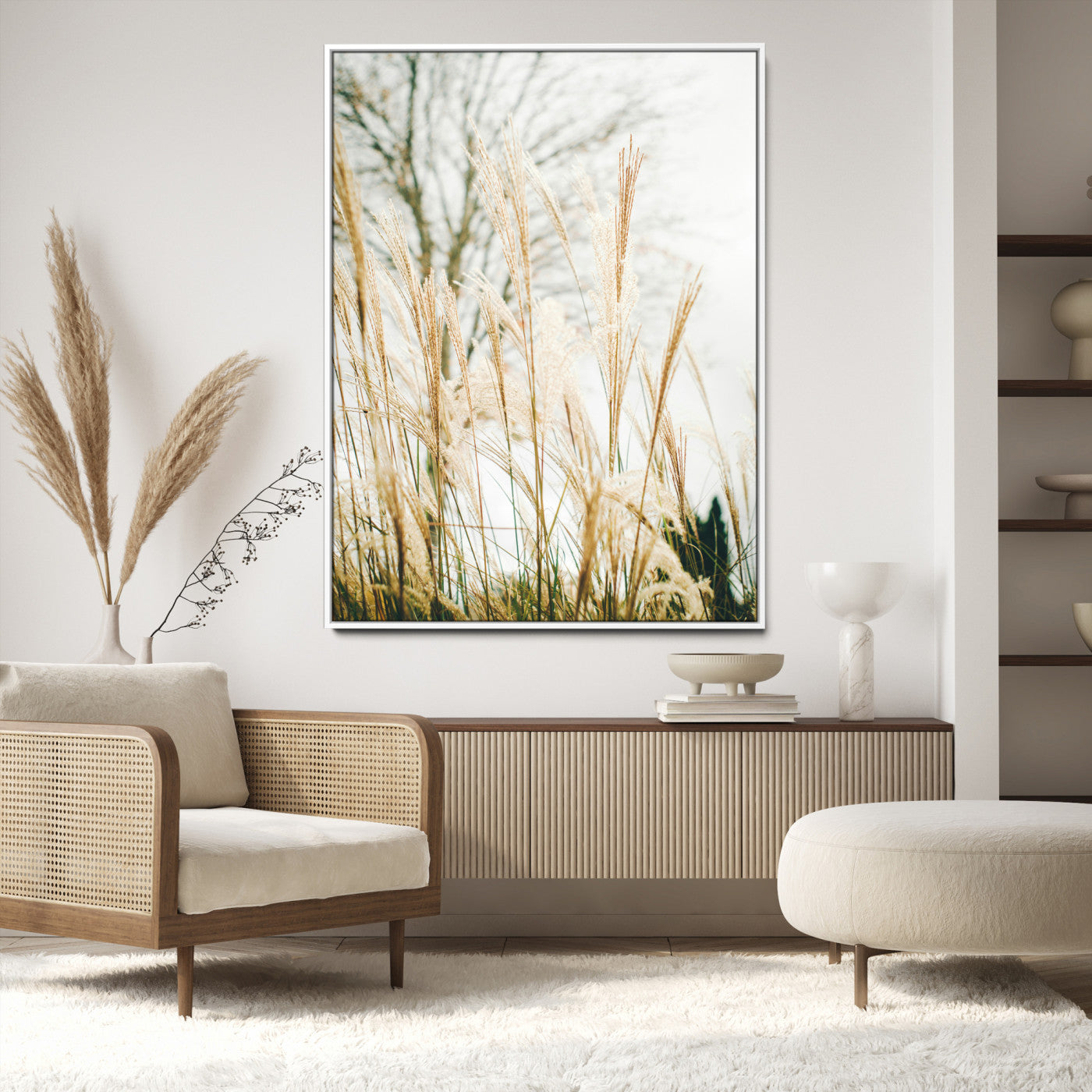 Soft beige pampas grass swaying in the breeze against a muted sky, creating a tranquil and minimalist botanical aesthetic.