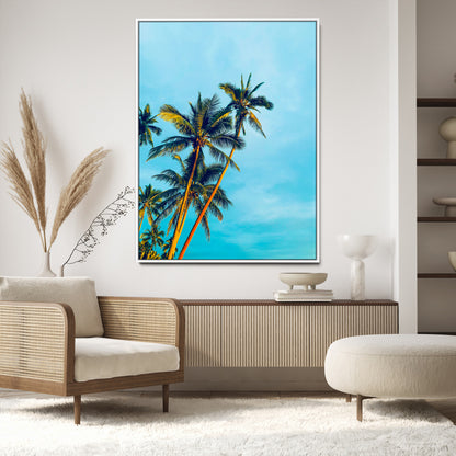 "Tall palm trees with golden sunlight against a vibrant blue sky, creating a tropical, relaxing atmosphere for coastal and beach-themed decor.