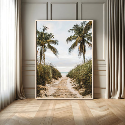 Canvas wall art of a tropical beach path with palm trees and dune grass, ideal for coastal entryways or tropical-inspired home decor.