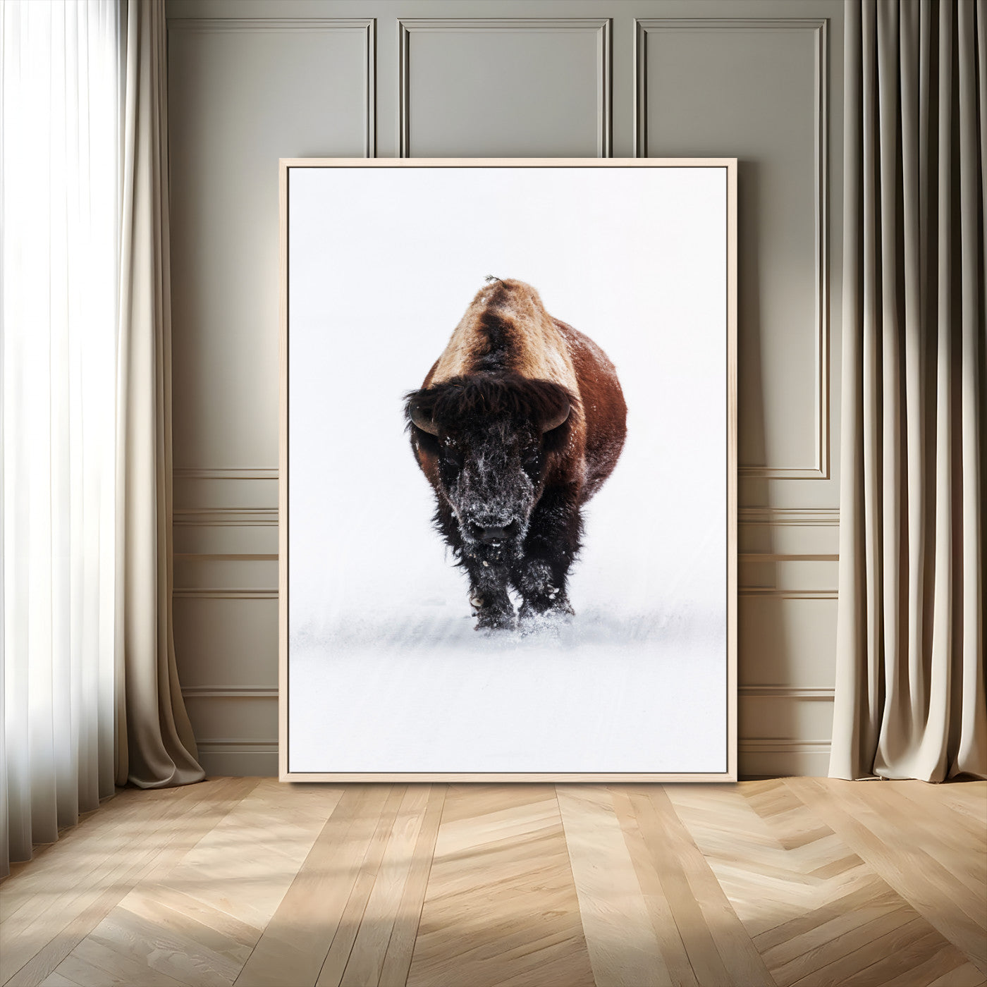 Front view of a strong bison walking in deep snow, isolated white background, perfect for rustic or lodge-style home decor.