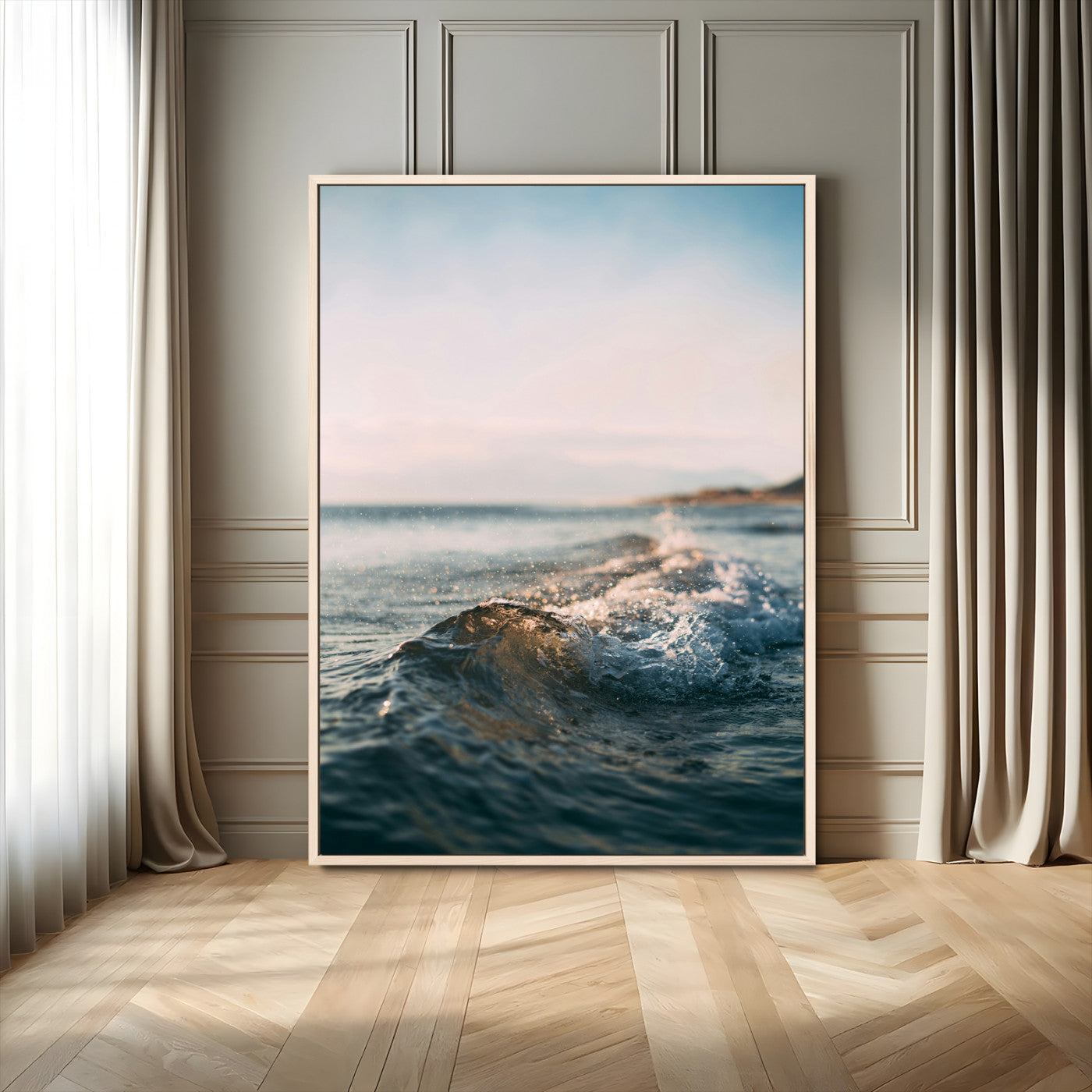 Close-up of ocean waves rolling gently toward the shore at sunset, creating a peaceful and minimalist coastal scene.