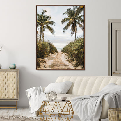 Canvas wall art of a tropical beach path with palm trees and dune grass, ideal for coastal entryways or tropical-inspired home decor.