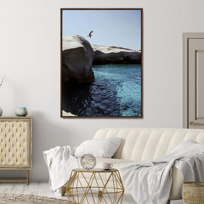 Canvas of a cliff diver above turquoise waters and rocky coastline under clear sky, ideal for adventurous minimalist or coastal home decor.