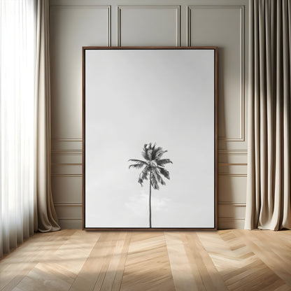Canvas of a single palm tree in black and white with minimalist sky, ideal for modern coastal minimalist or tropical-inspired home decor.