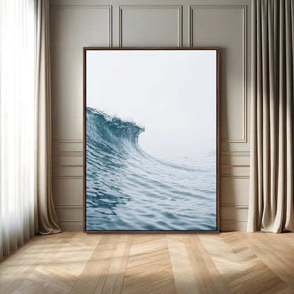 A single ocean wave curling in soft blue tones under a misty sky, ideal for coastal or minimalist home wall decor.