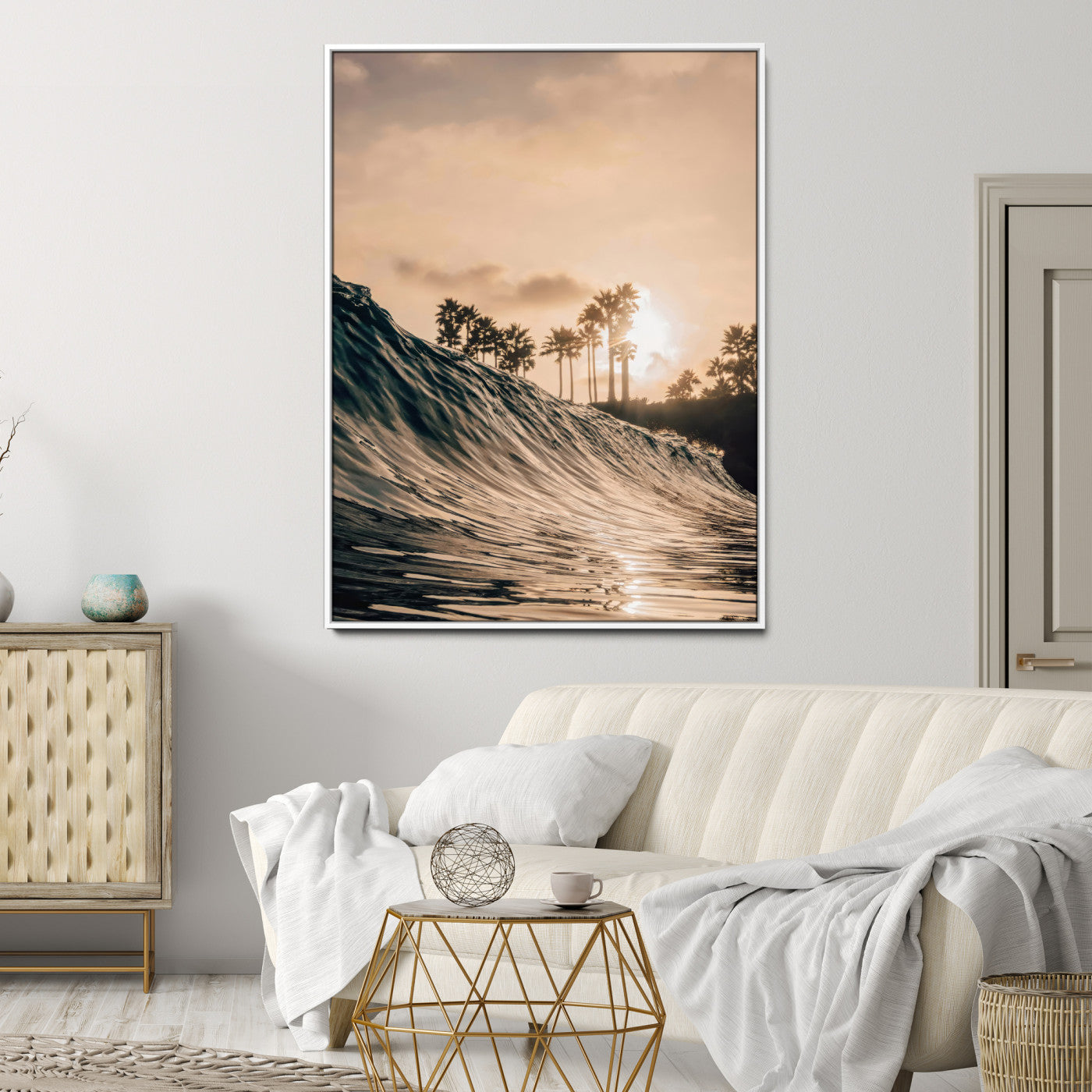 Golden sunset view of an ocean wave curling near palm trees, radiating warm tones perfect for coastal or tropical-themed decor.