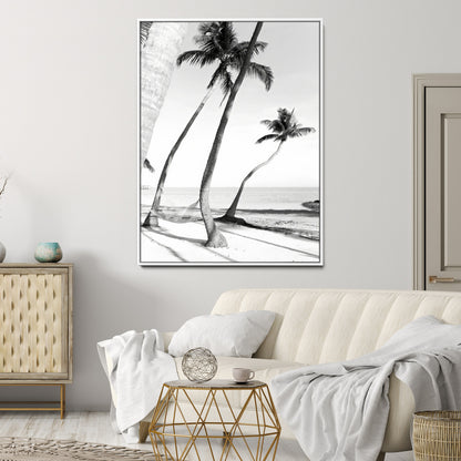 Black and white wall art of palm trees and a hammock on a beach, ideal for coastal minimalist or tropical-themed decor.