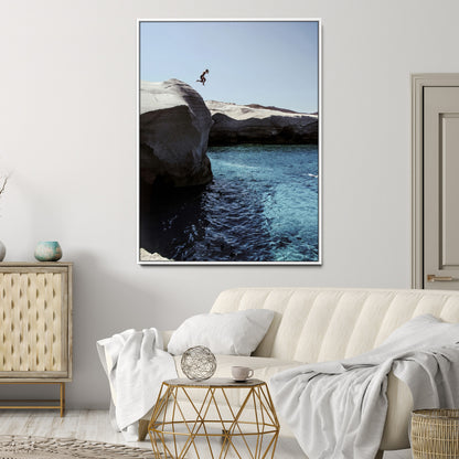 Canvas of a cliff diver above turquoise waters and rocky coastline under clear sky, ideal for adventurous minimalist or coastal home decor.