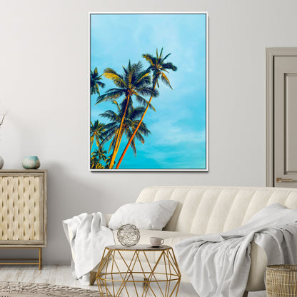"Tall palm trees with golden sunlight against a vibrant blue sky, creating a tropical, relaxing atmosphere for coastal and beach-themed decor.