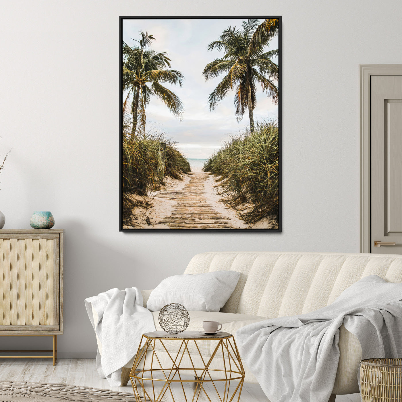 Canvas wall art of a tropical beach path with palm trees and dune grass, ideal for coastal entryways or tropical-inspired home decor.